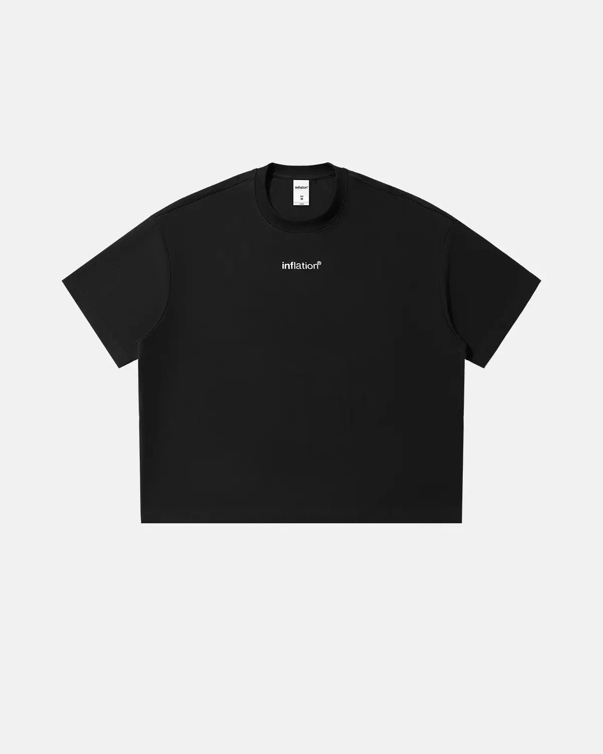 Inflation Streetwear Boxy Tee featuring the brand logo in black on a white cotton T-shirt, casual streetwear style.