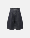 Deconstructed denim longline jorts by INFLATION, stylish pants featuring a distressed, oversized design with raw hem details.