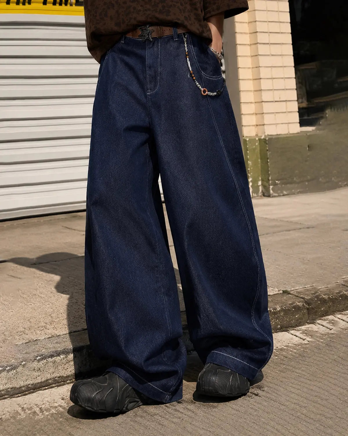 Raw washed barrel jeans by INFLATION Streetwear, showcasing relaxed fit denim pants with a raw, washed finish and classic barrel style.