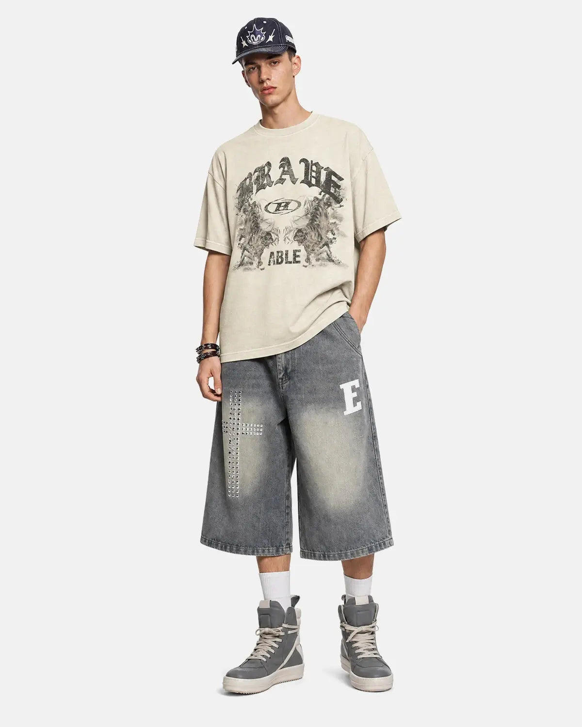 Light blue graphic washed vintage oversized T-shirt by INFLATION with retro design, soft fabric, and relaxed fit for streetwear style.
