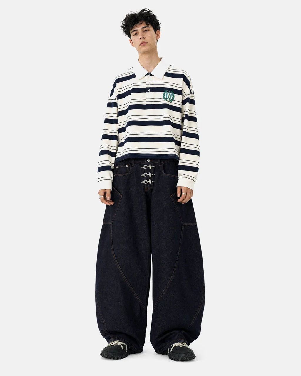 Raw barrel jeans with metal clasp detail from Inflation Streetwear, showcasing classic denim fabric and stylish design.