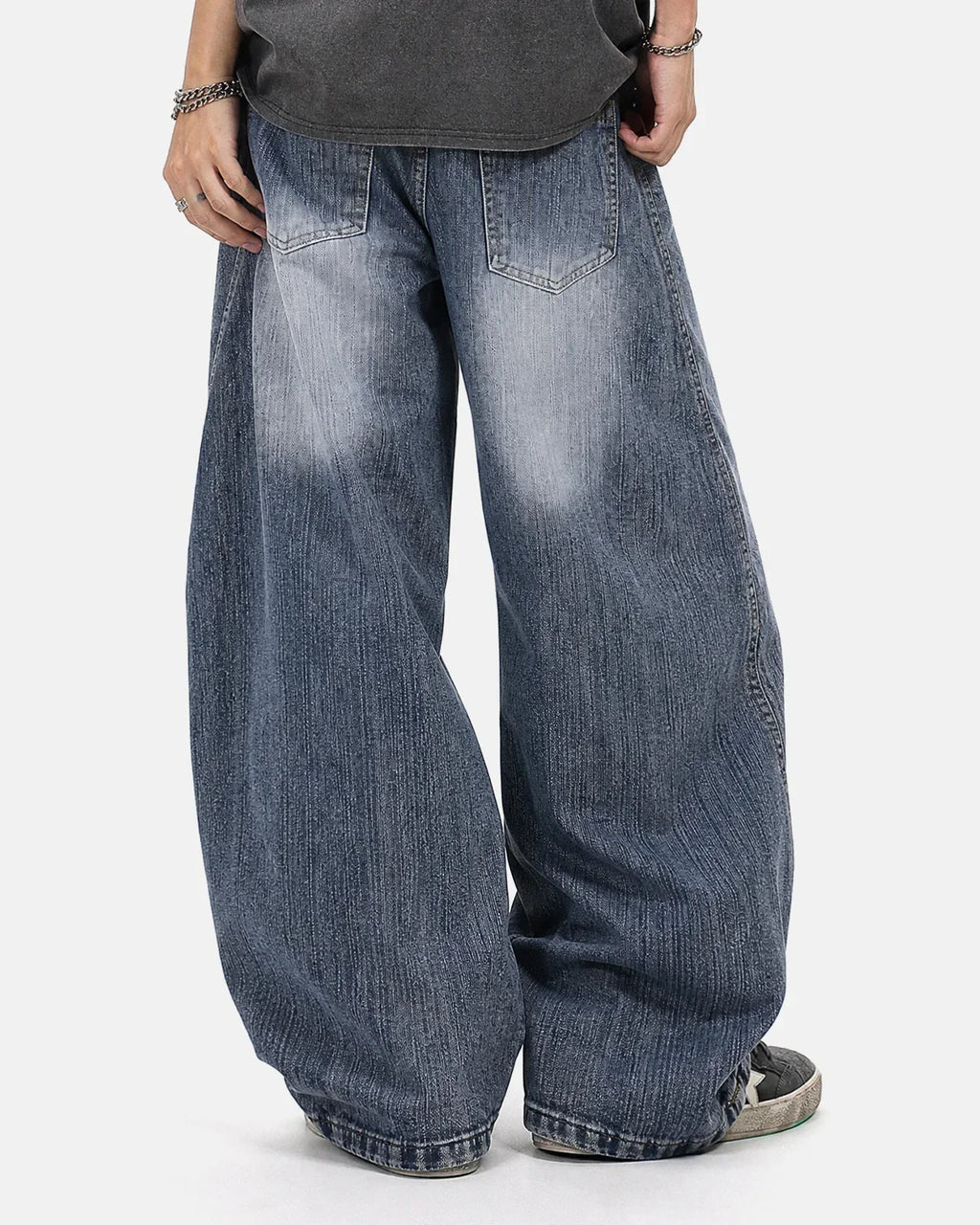 Inflation Streetwear belted bamboo weave barrel jeans, featuring a relaxed fit and stylish design, displayed on a neutral background.