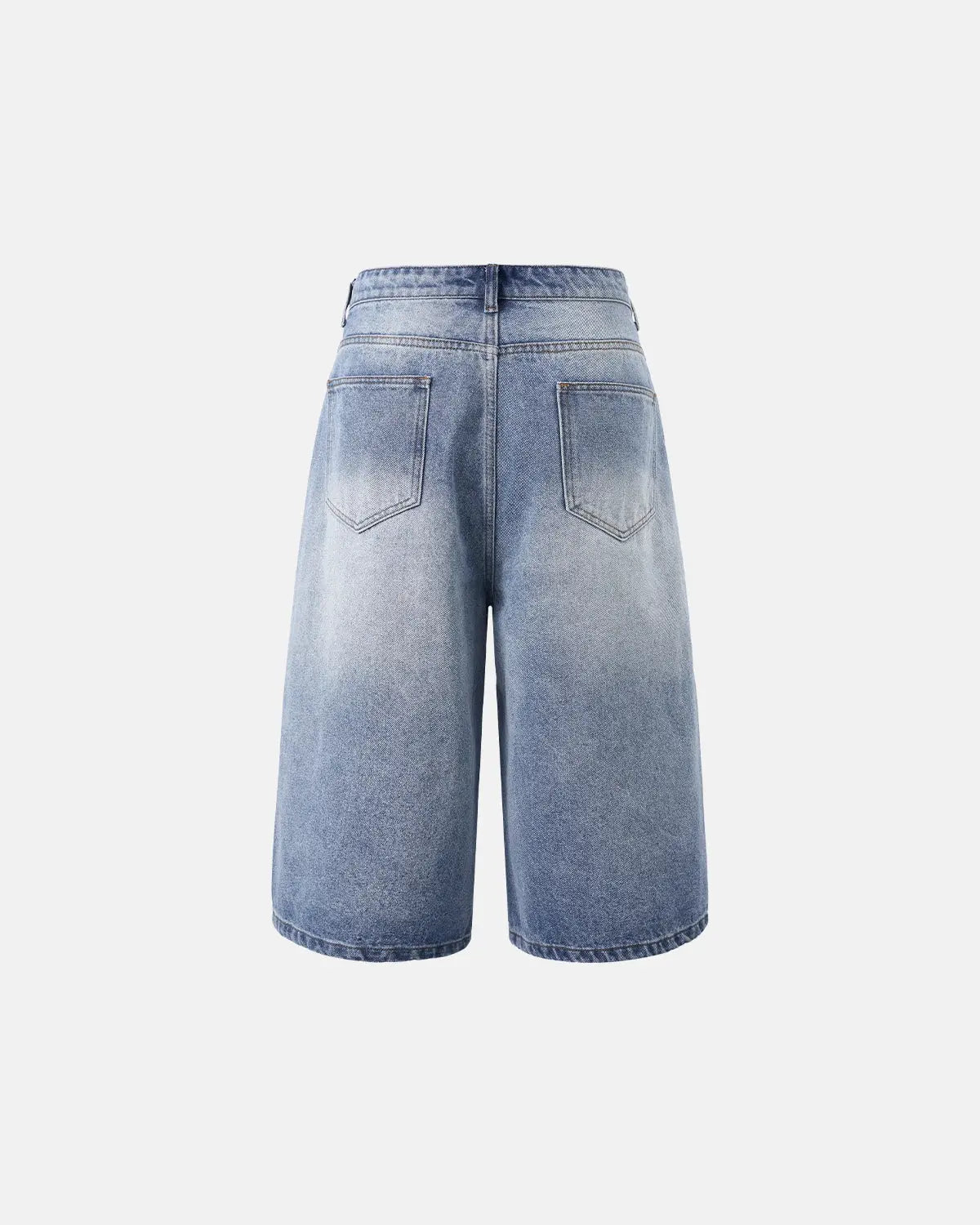 Inflation streetwear washed baggy longline jorts pants with a relaxed fit and distressed denim look, displayed flat on a white background.