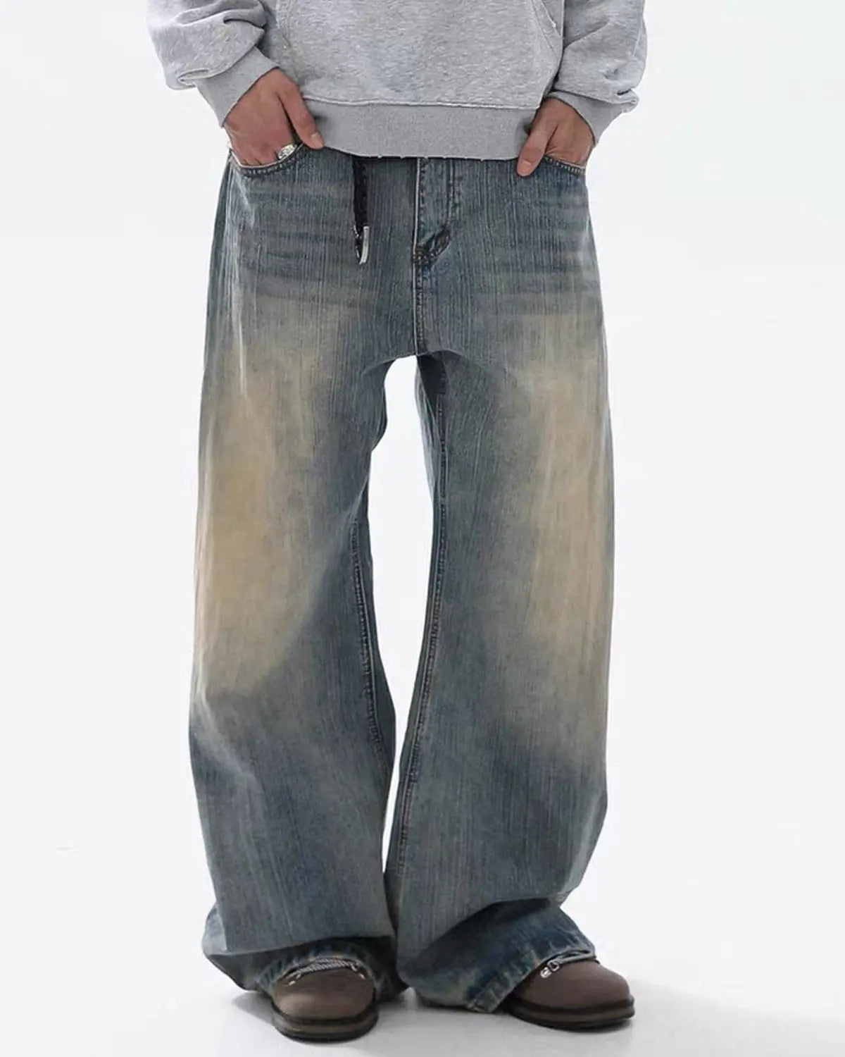 Washed bamboo weave baggy bootcut jeans by INFLATION featuring relaxed fit and casual streetwear style.