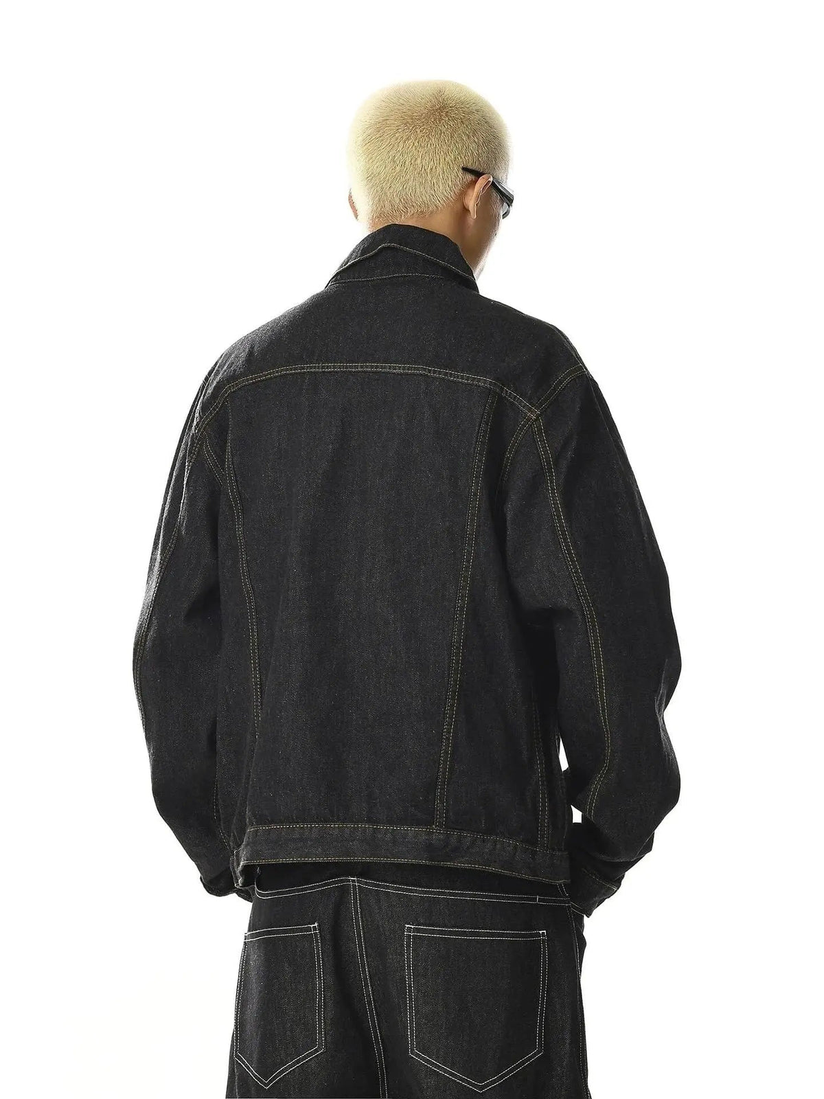 Black multi-pocket denim jacket by INFLATION, featuring a stylish streetwear design with multiple functional pockets.