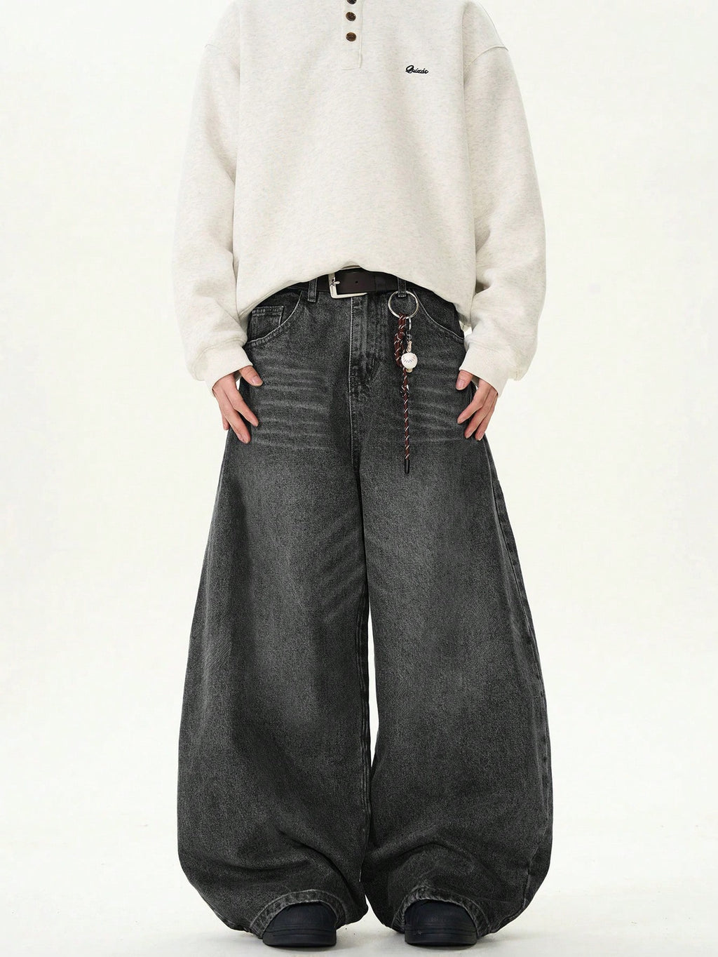 Inflation vintage denim jeans with wide leg, distressed details, loose fit, and classic retro style.