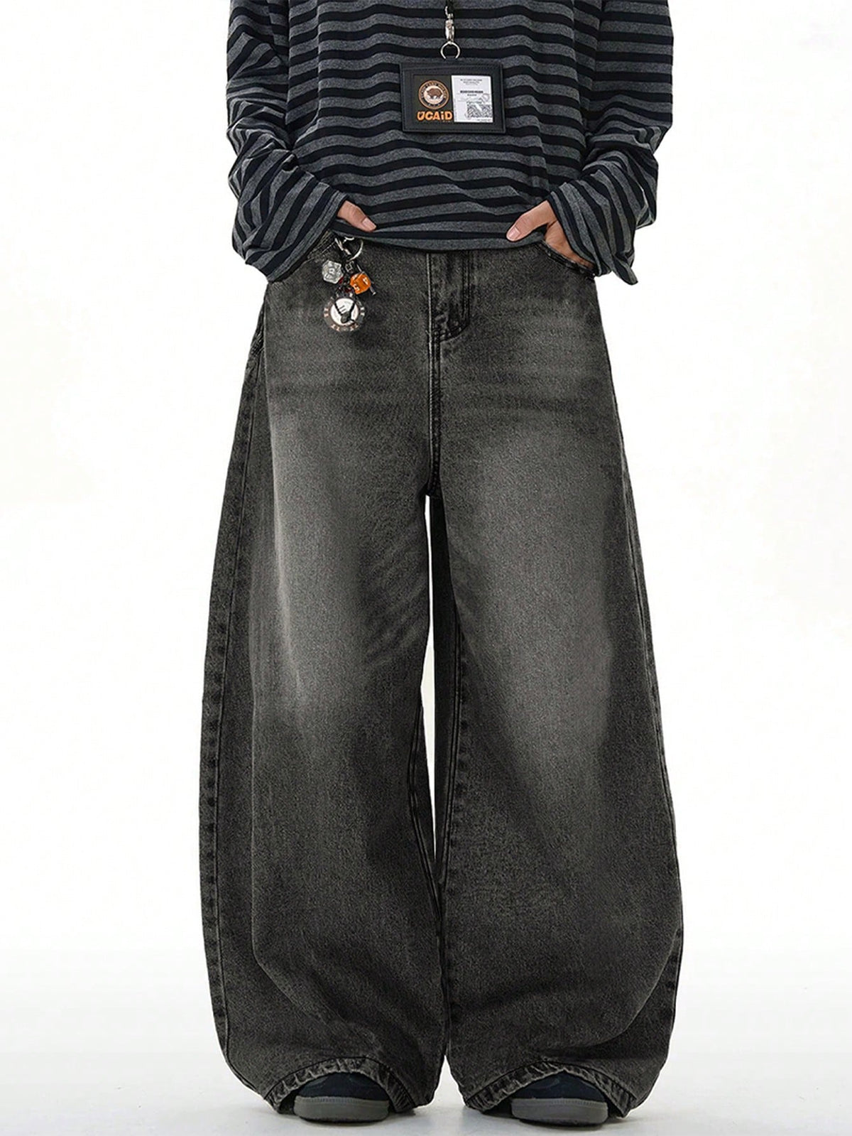 Inflation distressed vintage denim jeans with wide leg and loose fit, showcasing worn details and classic blue denim texture.