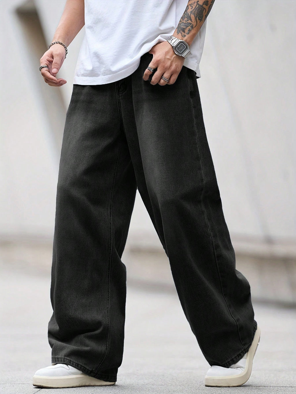 Black loose denim jeans from Inflation Street Style collection, showing relaxed fit and classic five-pocket design.