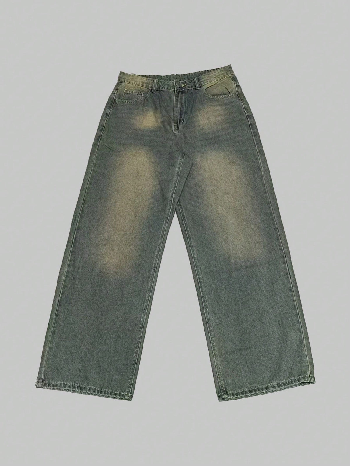 Inflation vintage denim jeans with wide leg fit, distressed details, and loose style on a model.