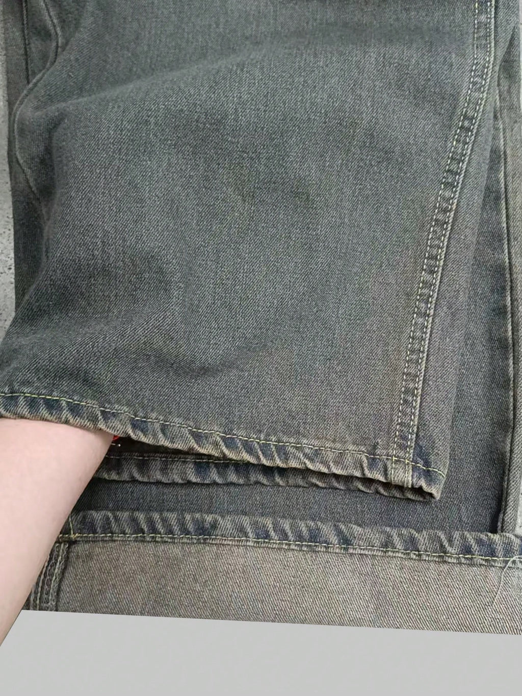 Inflation vintage denim jeans with wide leg fit, distressed details, loose style, and classic blue wash.