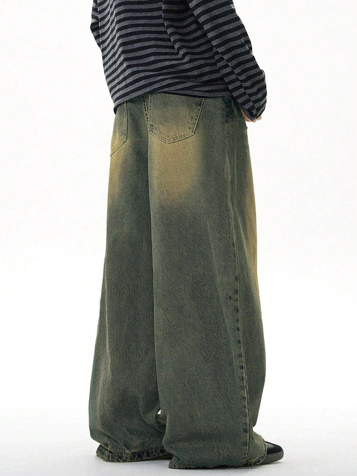 Inflation wide leg distressed vintage denim jeans with loose fit and classic blue wash, featuring ripped details and relaxed style.