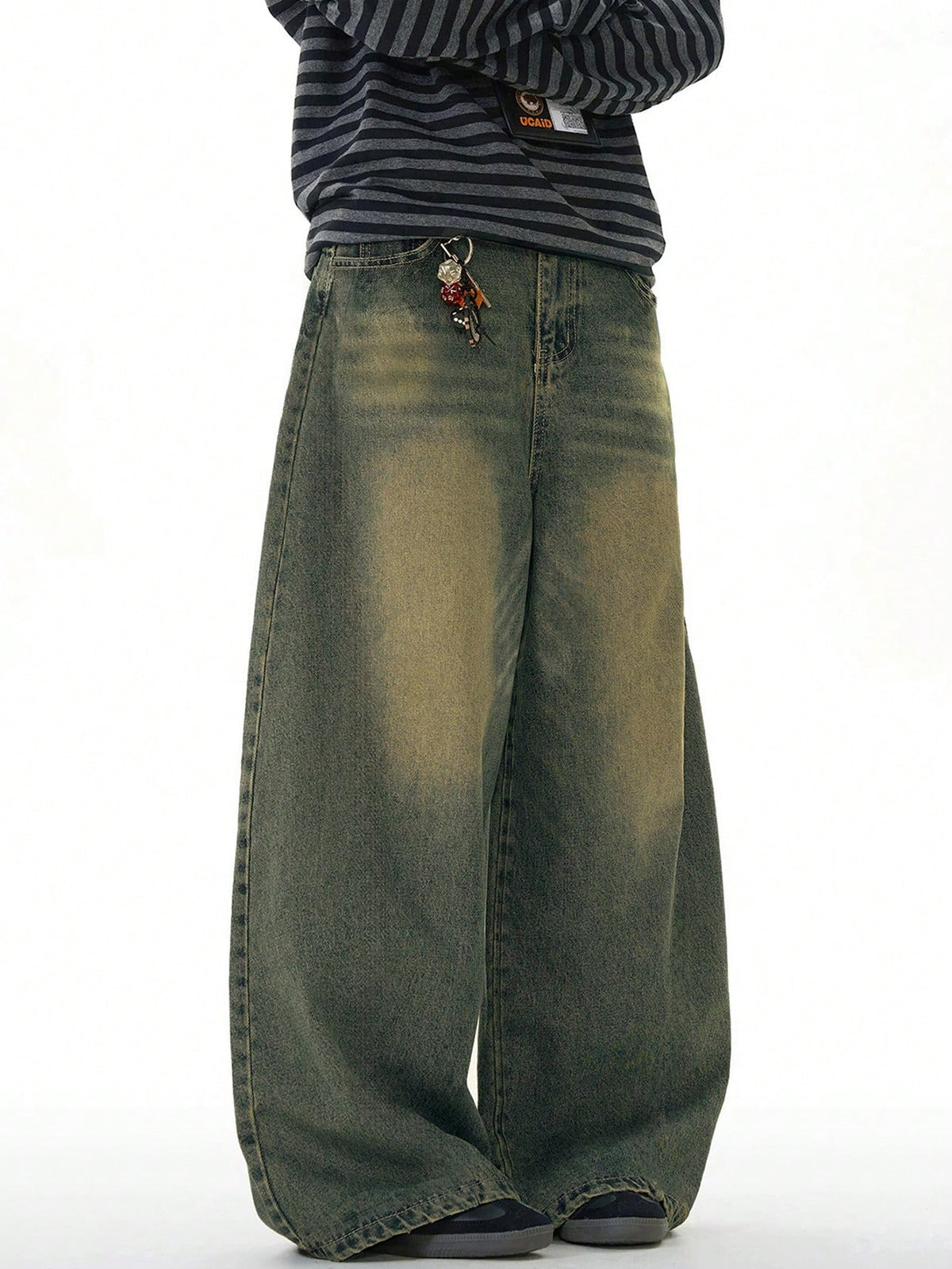 Inflation vintage distressed denim jeans with wide leg and loose fit, featuring a distressed, worn-in look.