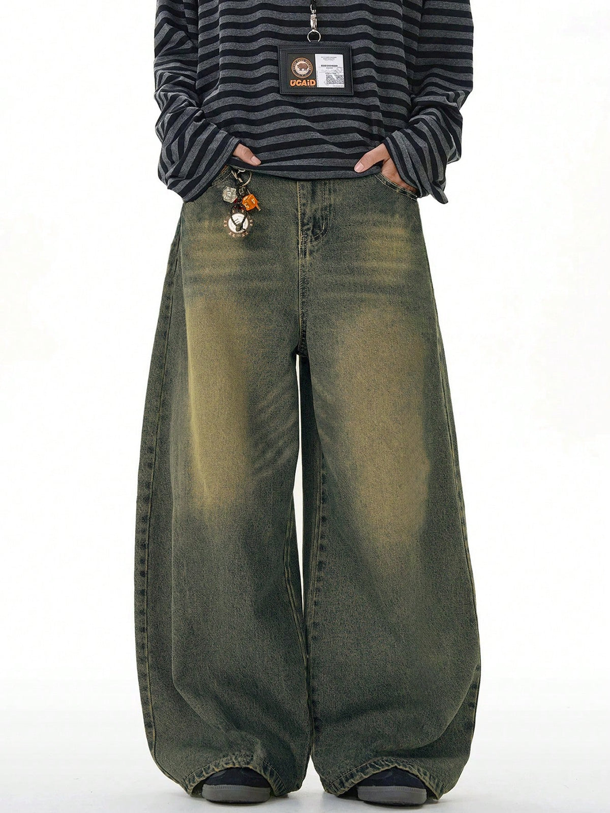 Inflation vintage distressed denim jeans with wide leg fit and loose style, showcasing a relaxed, trendy look.
