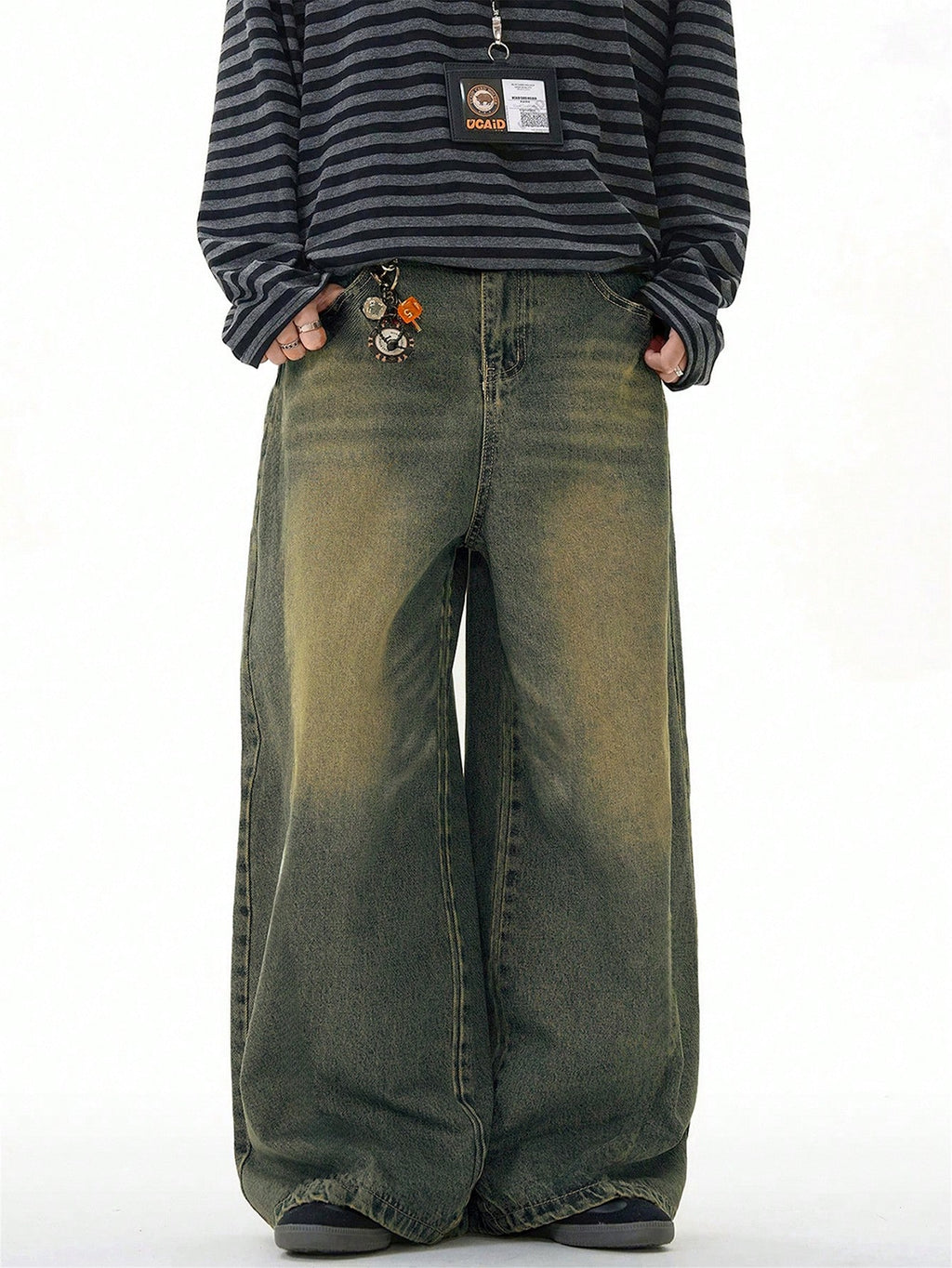 Inflation distressed vintage denim jeans with wide leg, loose fit, and distressed details, showcasing a casual, relaxed style.
