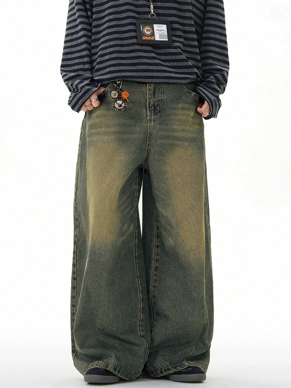Inflation distressed vintage denim jeans with wide leg, loose fit, and distressed details, showcasing a casual, relaxed style.