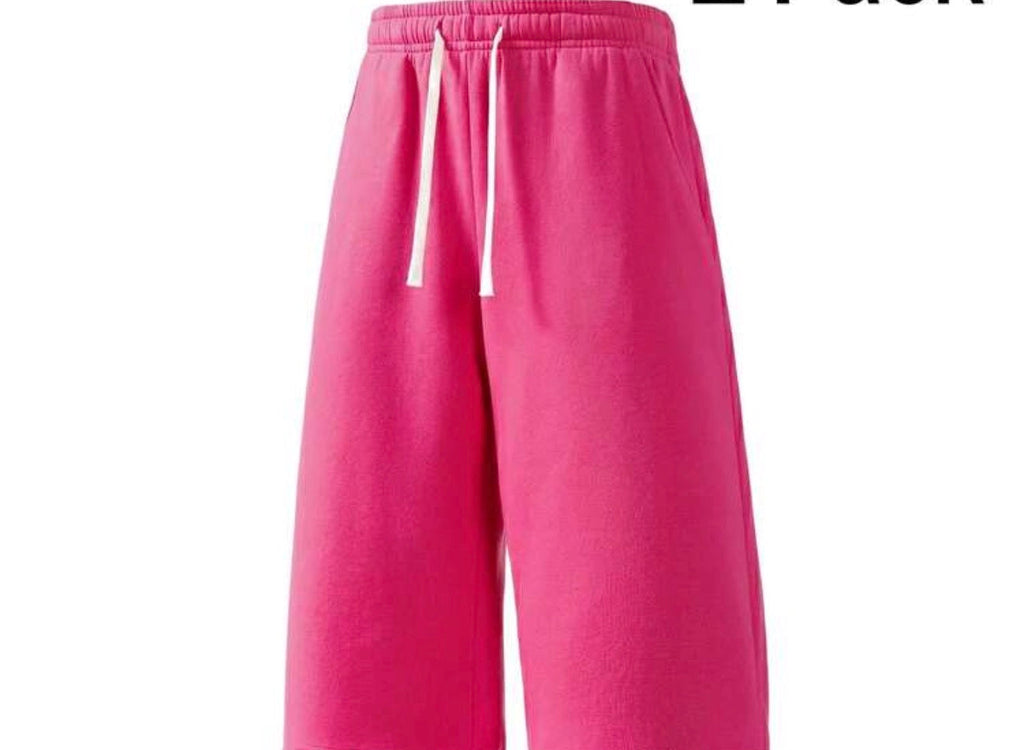 Inflation trending long jogger shorts with elastic waistband and pockets, made from soft comfortable fabric.