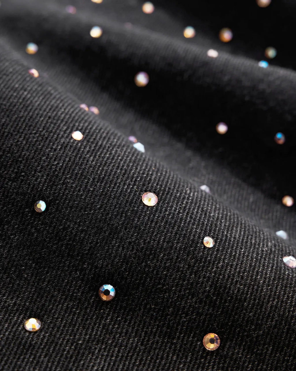 Acid washed rhinestone baggy jeans by INFLATION featuring distressed denim and decorative rhinestones, casual streetwear style.