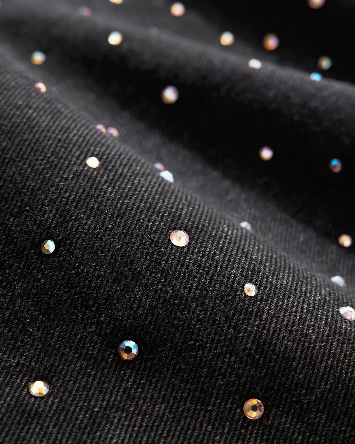 Acid washed rhinestone baggy jeans by INFLATION featuring distressed denim and decorative rhinestones, casual streetwear style.
