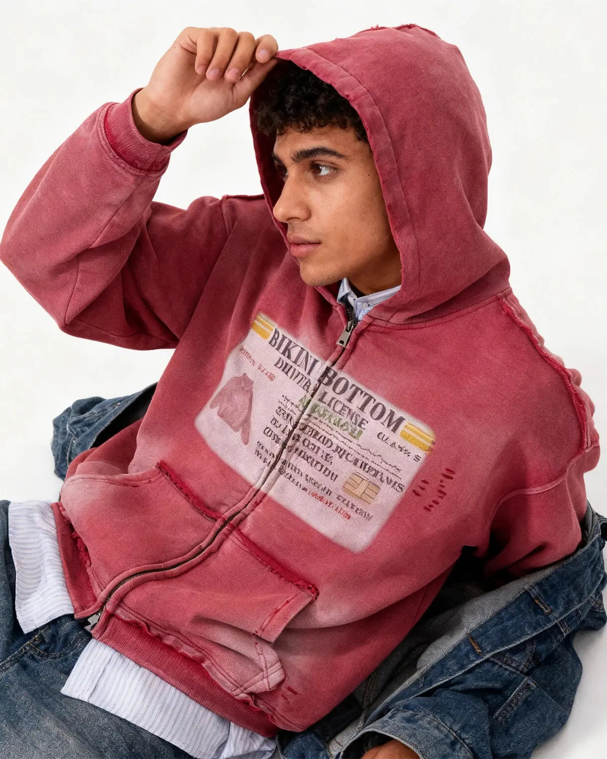 Inflation Streetwear graphic ripped washed zip-up hoodie with distressed details and casual fit, displayed on a hanger.