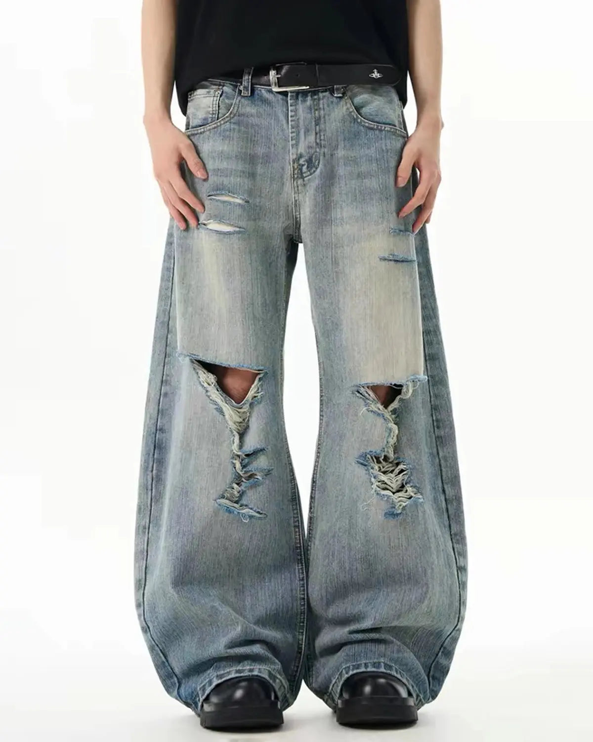 Bamboo weave distressed baggy jeans by INFLATION featuring a relaxed fit, ripped details, and casual streetwear style.