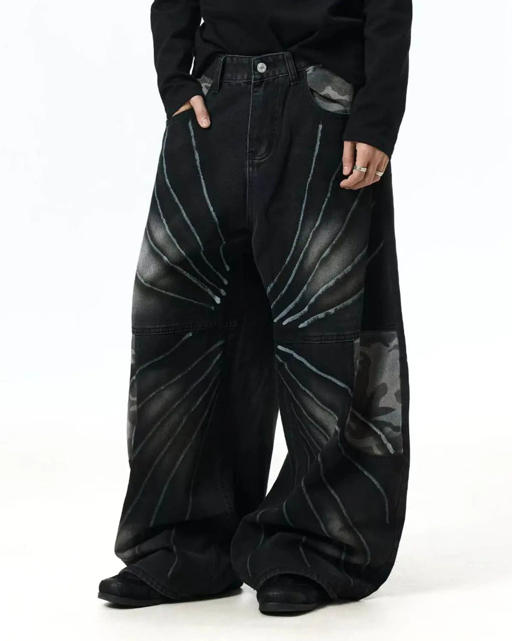 Inflation Spray Graphic Camo Barrel Jeans showing bold camouflage and spray paint design on relaxed-fit pants.