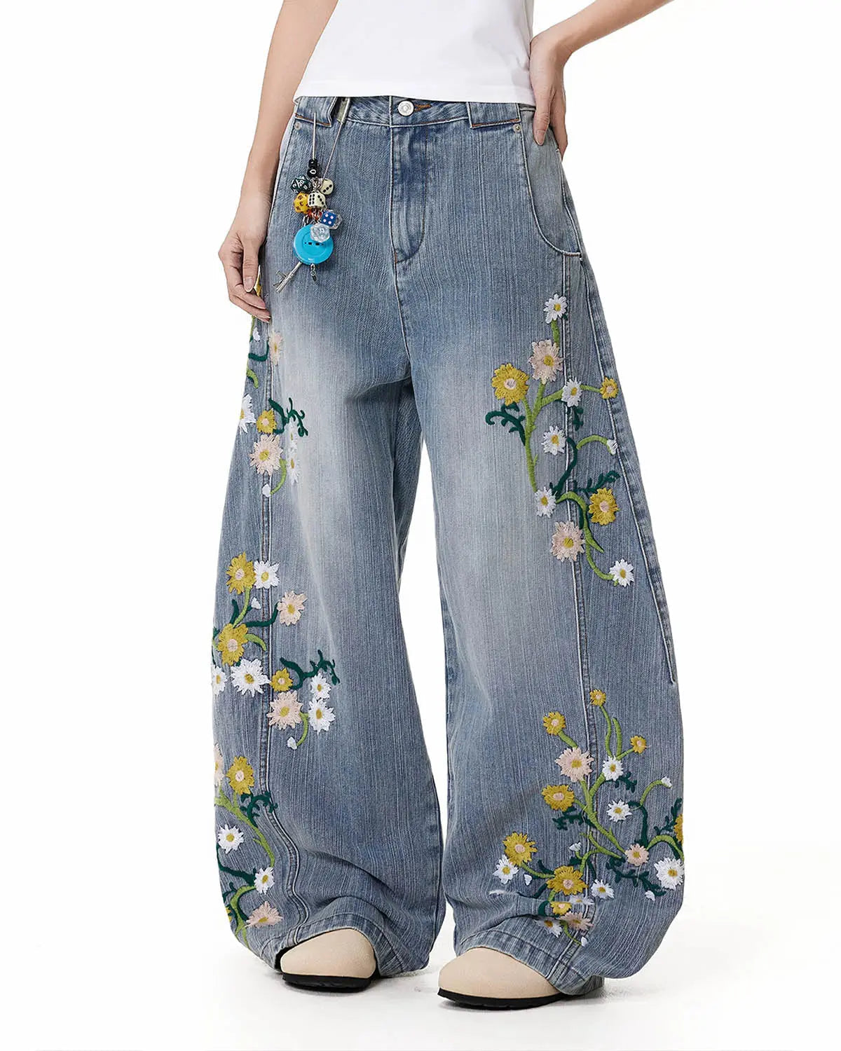 Inflation brand embroidery bamboo weave baggy jeans, loose-fitting streetwear pants with detailed embroidery and bamboo-inspired design.