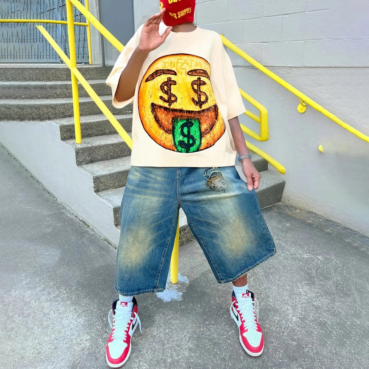 Boxy Smile Graphic T-Shirt by INFLATION, featuring a bold smiley face design on a stylish streetwear tee.