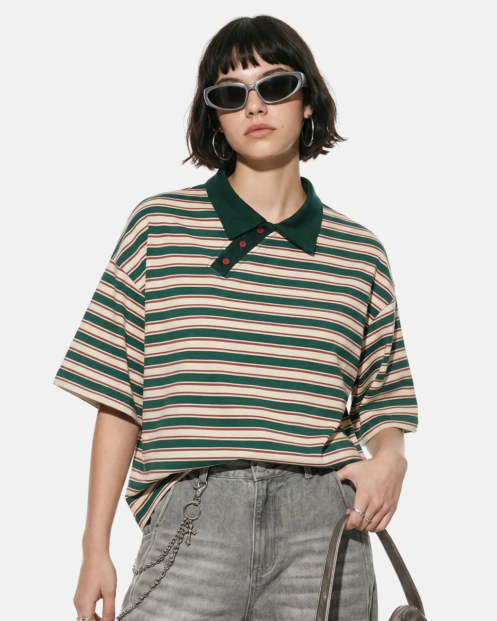 Asymmetric polo collar striped T-shirt by INFLATION featuring a stylish design and casual fit, displayed on a model.