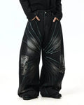 Inflation Spray Graphic Camo Barrel Jeans, stylish streetwear pants with bold spray paint camo pattern and relaxed fit.