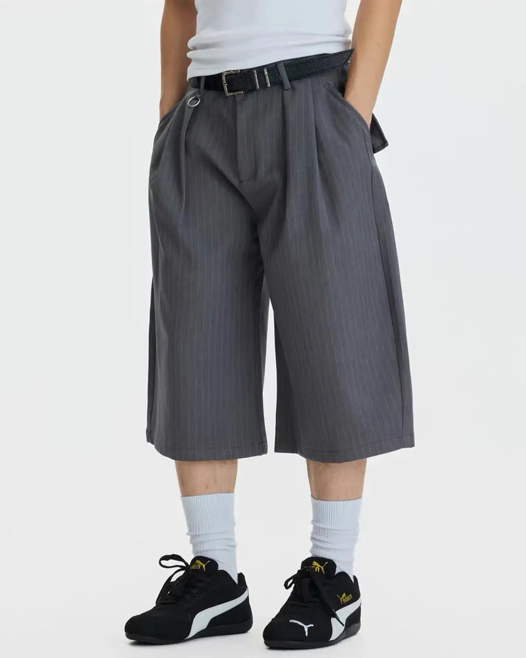 Inflation streetwear pinstripe pleated ring detail tailored shorts, stylish pants with a tailored fit and unique ring accents.
