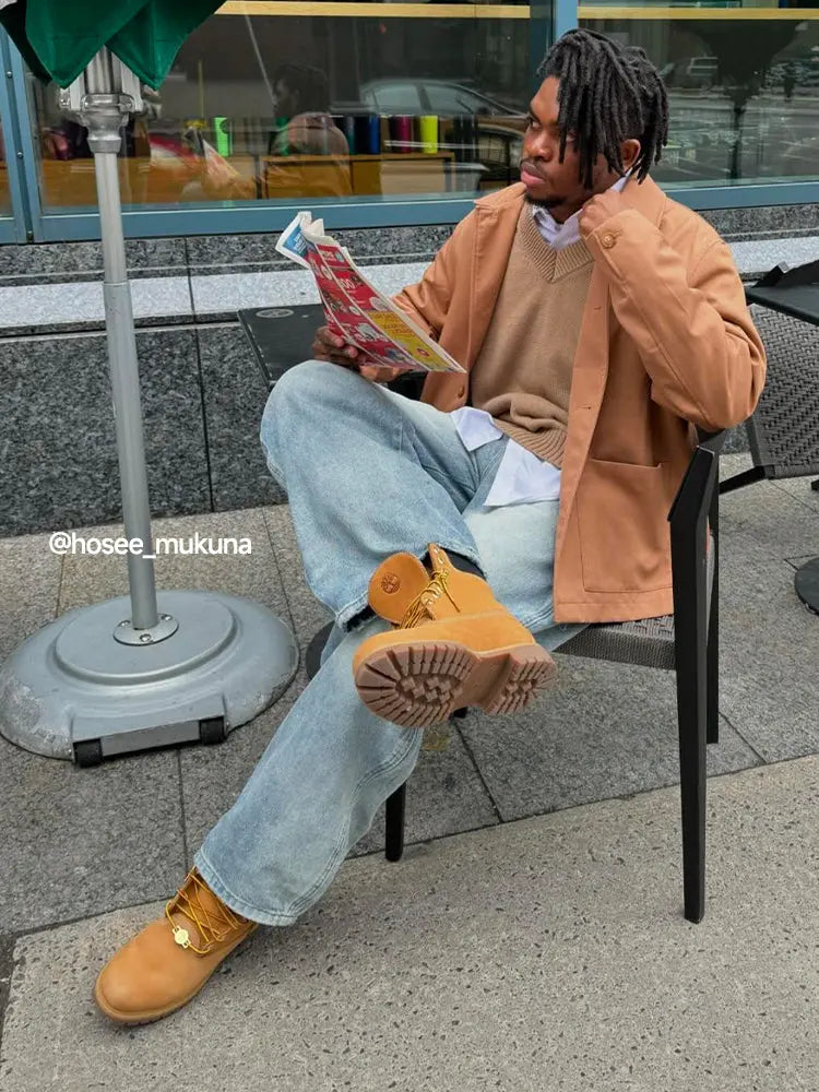 INFLATION Wave Washed Baggy Jeans, relaxed-fit denim pants with a distressed wash and oversized style, front view showing waistband and pockets.
