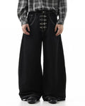 Raw metal clasp baggy jeans from INFLATION Streetwear featuring a relaxed fit and distressed denim design.