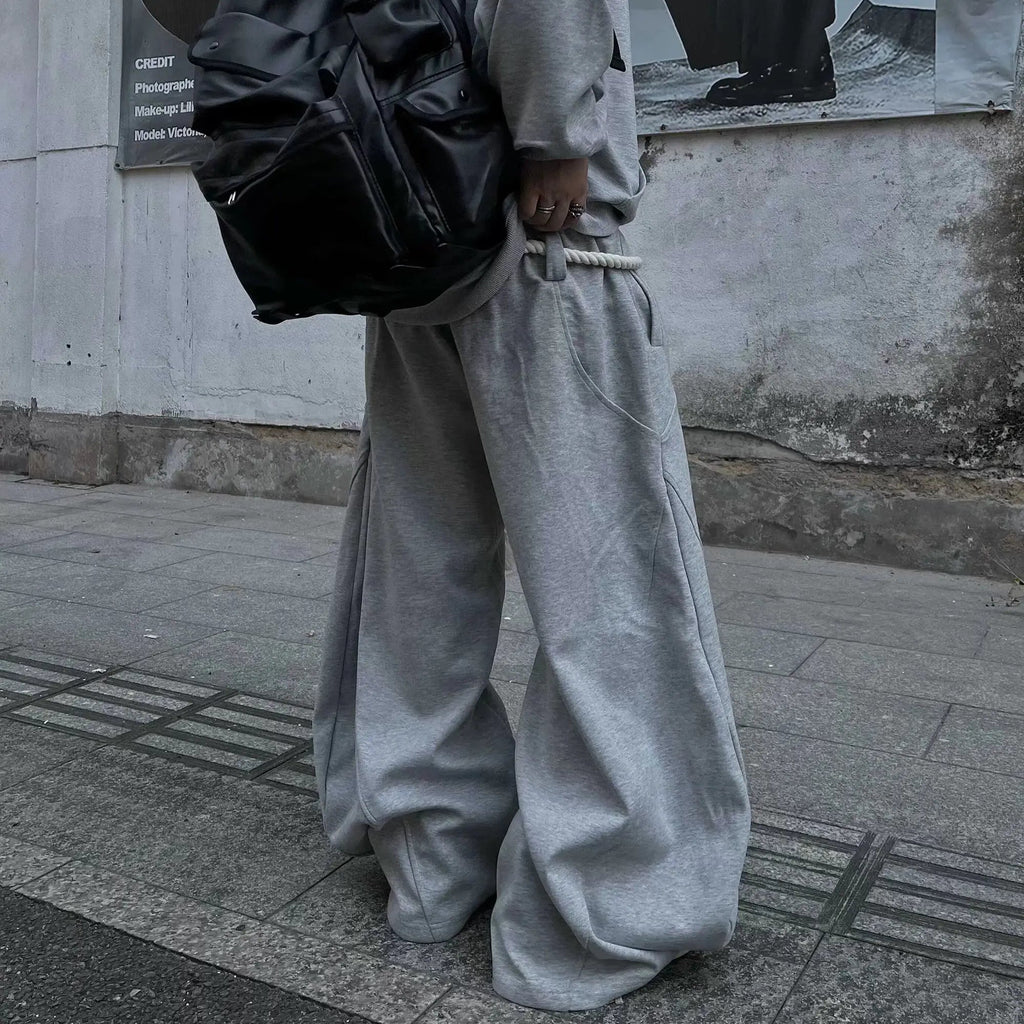 Inflation Super Baggy Barrel Sweatpant in black, featuring a relaxed fit and streetwear style, shown on a model.