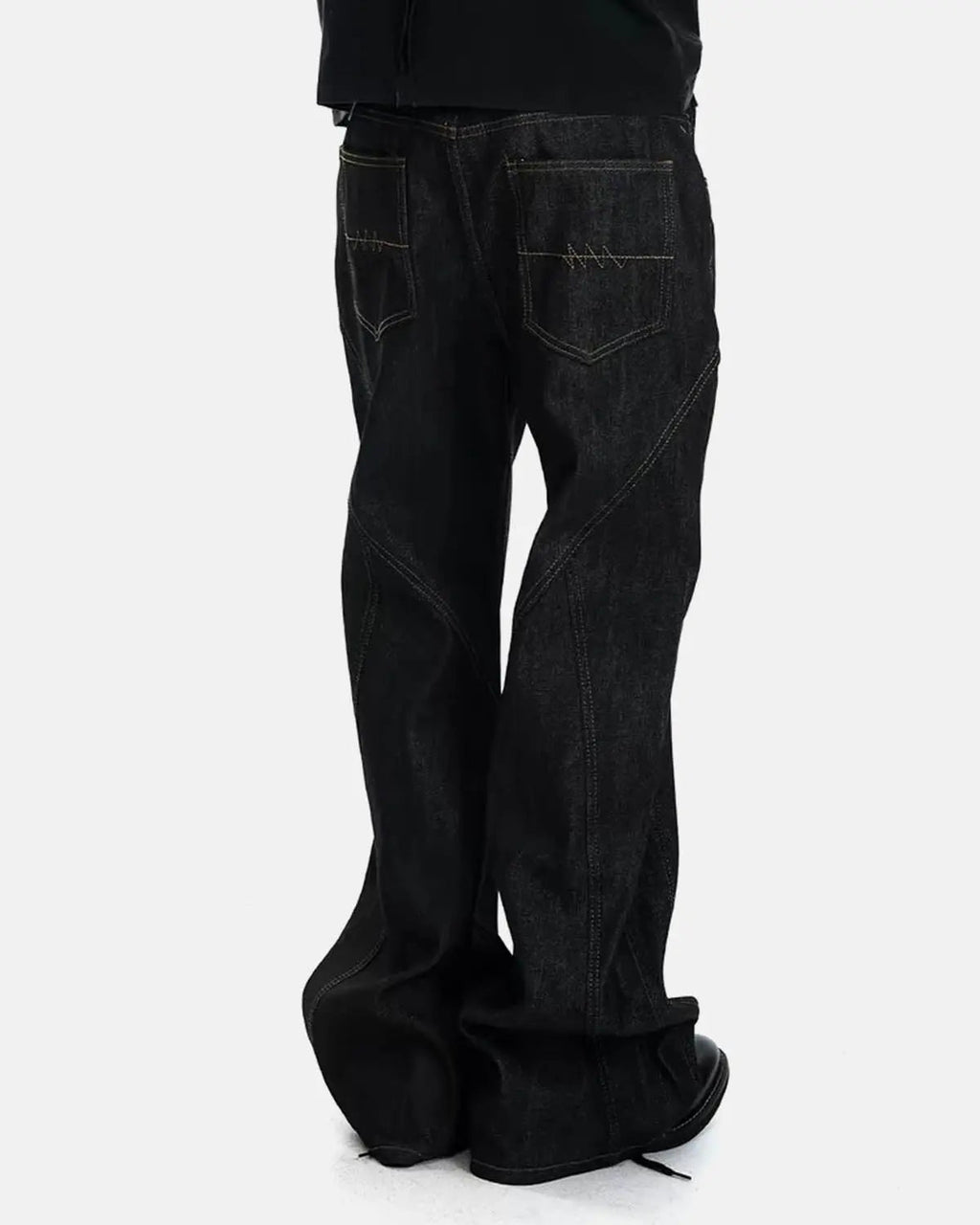 Inflation streetwear asymmetric button bootcut jeans with stylish design, visible button details and classic denim fabric.