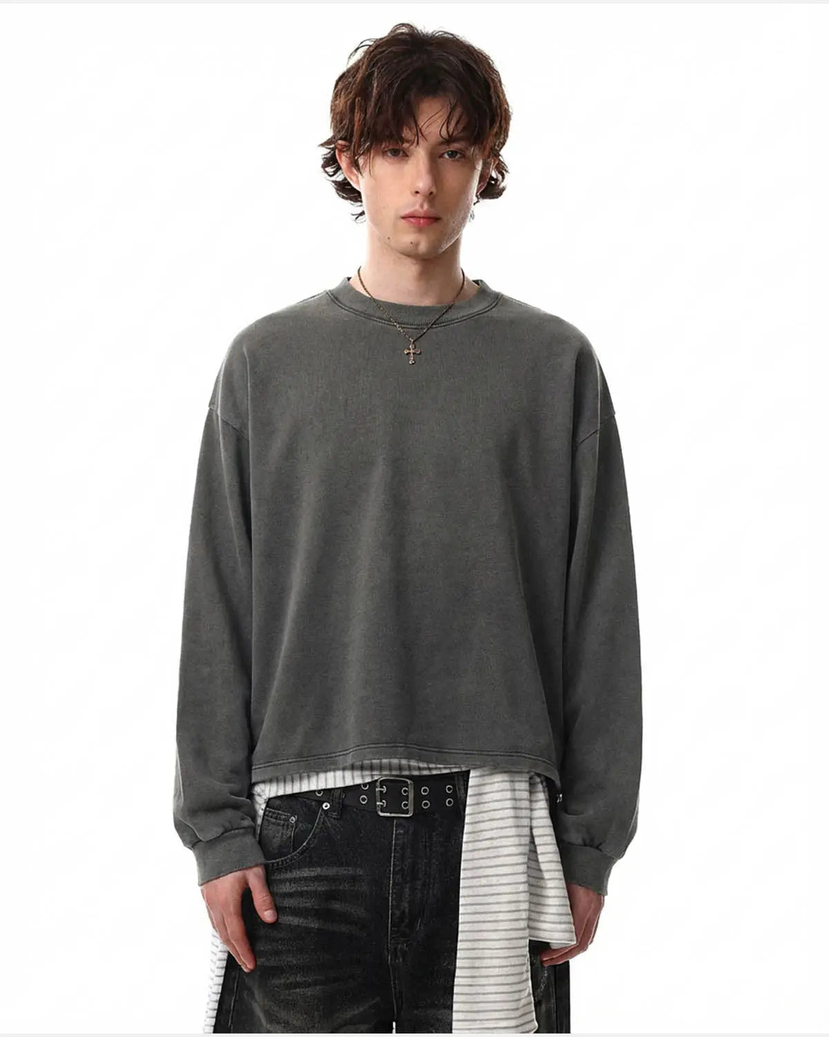 Distressed washed long sleeve tee by INFLATION, featuring a casual, vintage-inspired design with faded details and a relaxed fit.