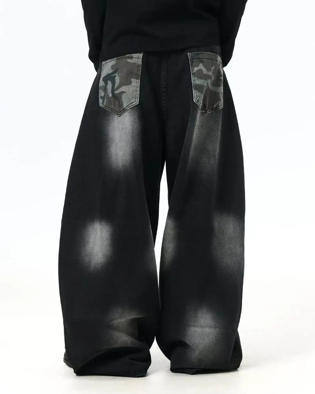 Inflation Spray Graphic Camo Barrel Jeans showing camouflage pattern and relaxed fit, denim pants style with graphic design accents.