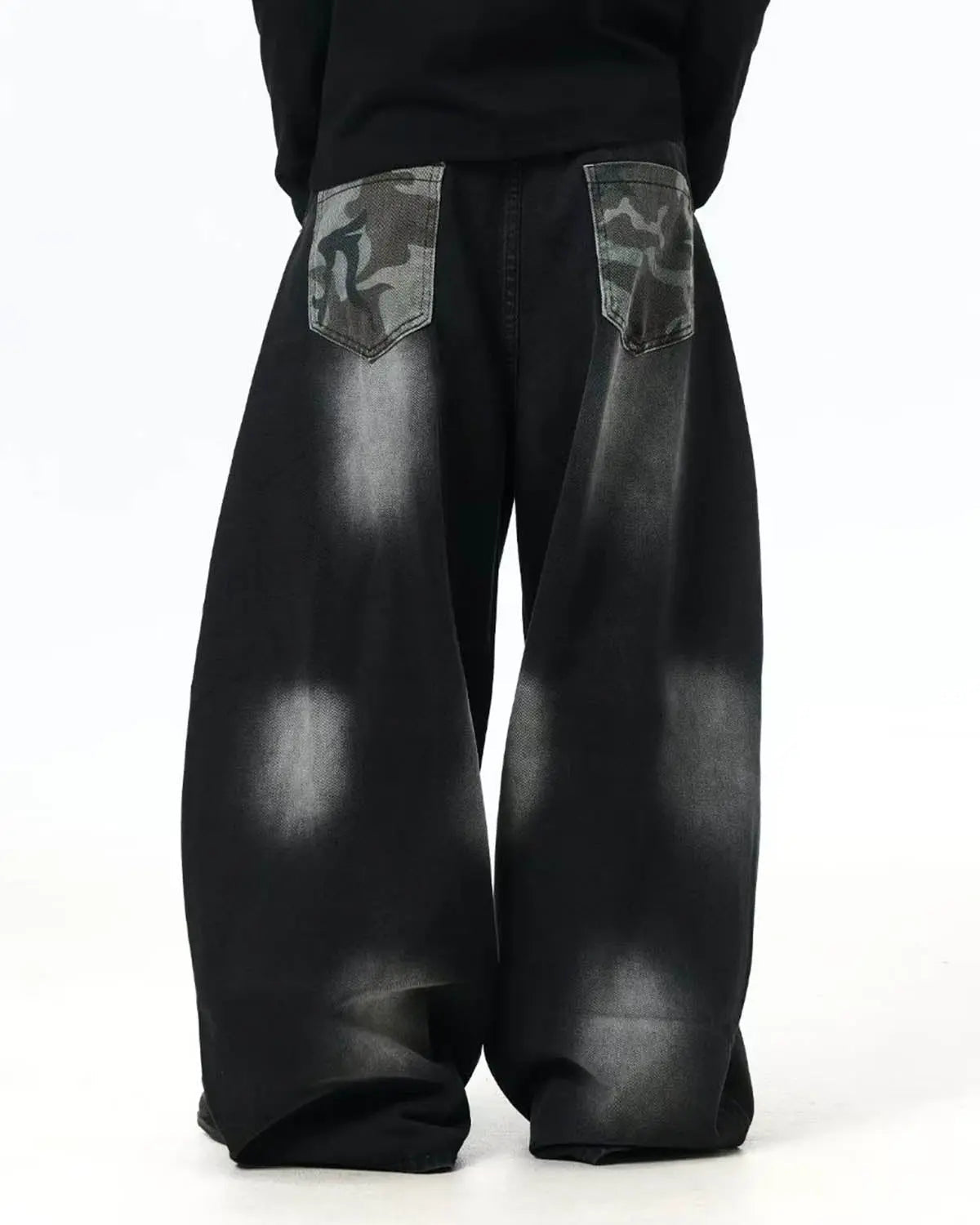 Inflation Spray Graphic Camo Barrel Jeans showing camouflage pattern and relaxed fit, denim pants style with graphic design accents.