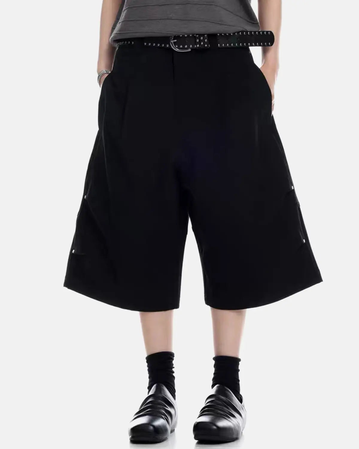 Inflation Streetwear pleated cinch back tailored shorts, beige pants with a high waist and tailored fit, styled for casual wear.