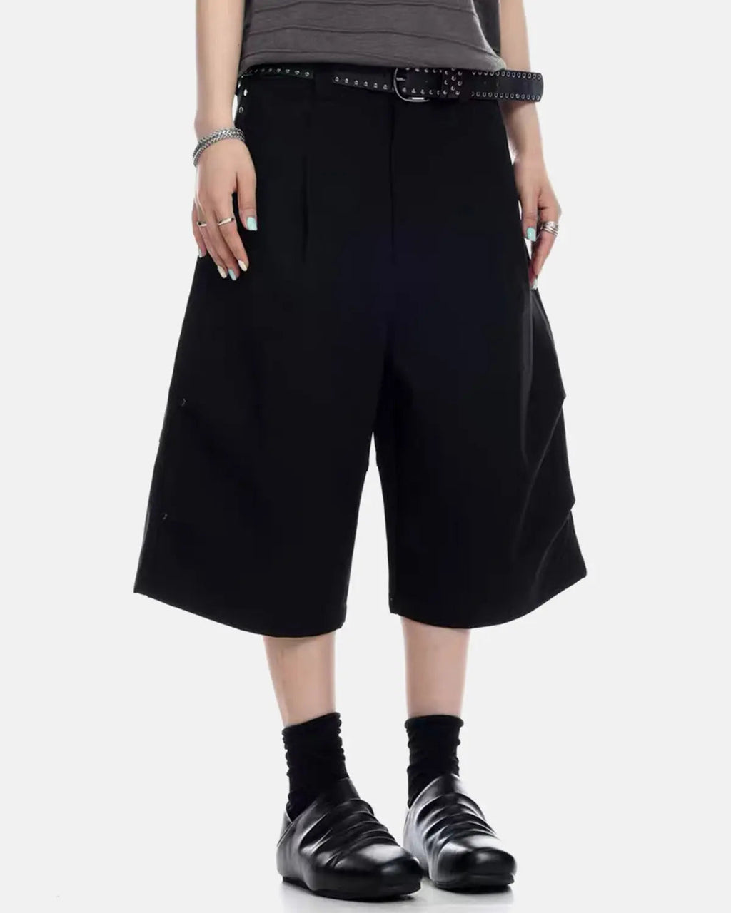 Inflation streetwear pleated cinch back tailored shorts in neutral fabric, showcasing the waistband and pleated design.