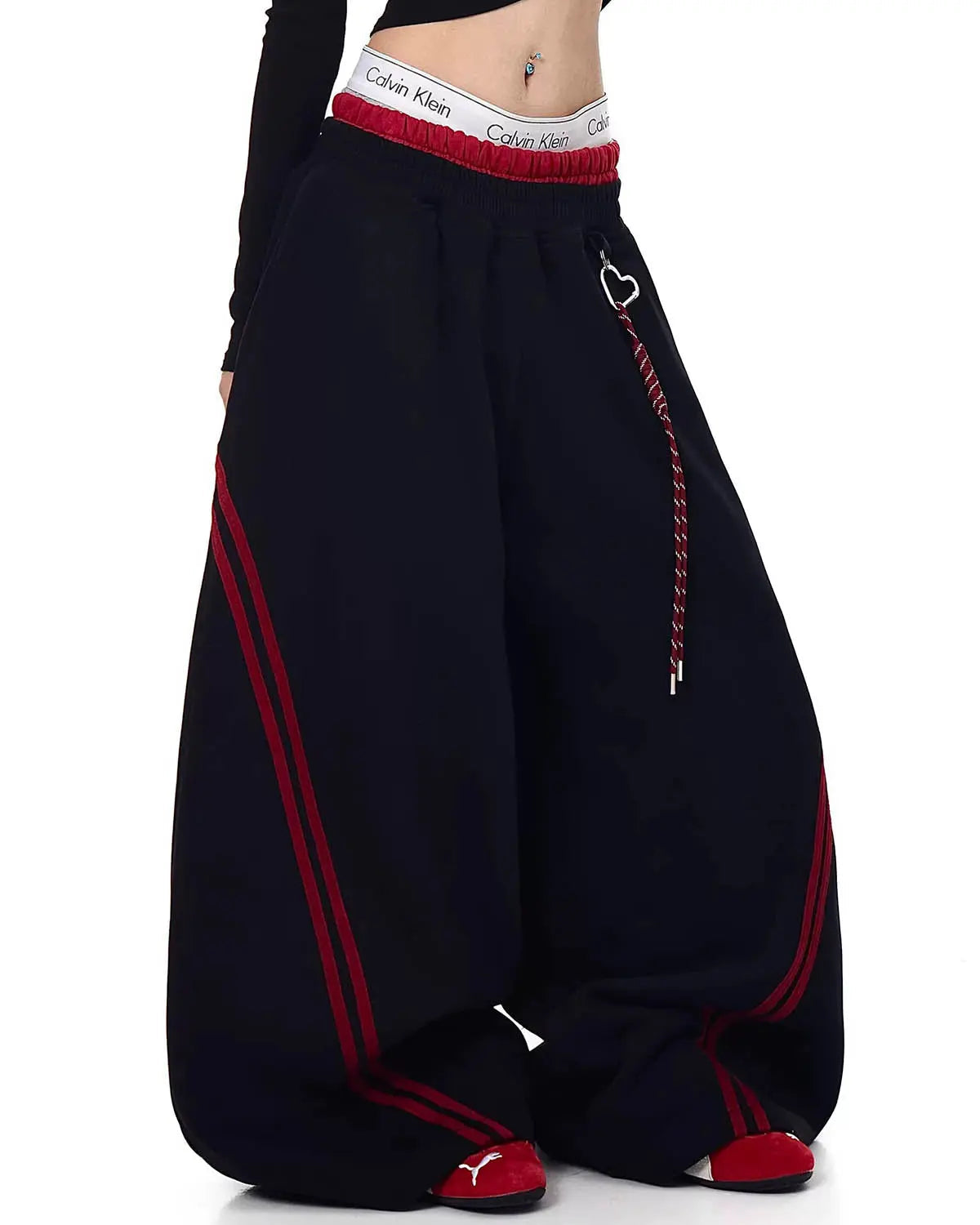 Grey striped baggy sweatpants from INFLATION Streetwear with a relaxed fit and stylish striped pattern.