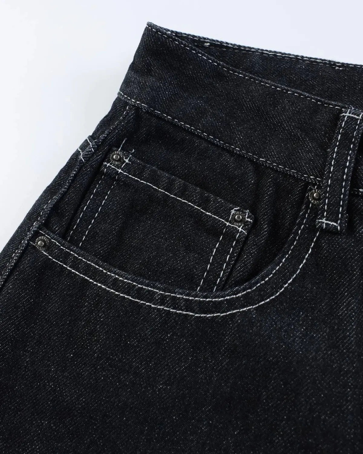 Inflation raw denim jorts with buckle detail, casual streetwear pants featuring distressed edges and a relaxed fit.