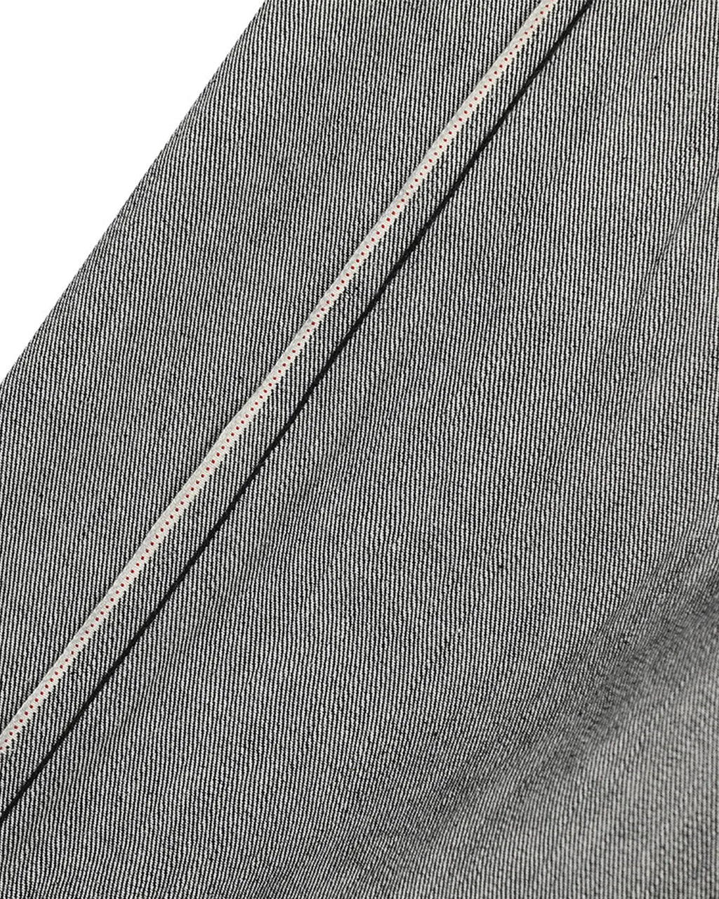 Raw straight-leg denim pants by INFLATION featuring classic blue denim fabric and a relaxed fit, displayed hanging on a plain background.