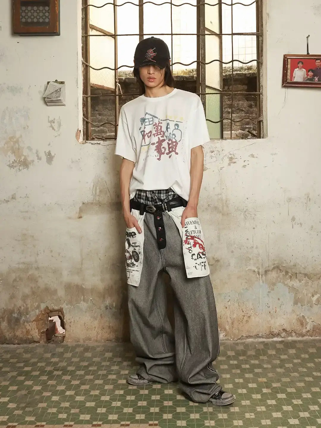 Distressed reverse design baggy jeans by INFLATION featuring ripped details and a loose, oversized fit for streetwear style