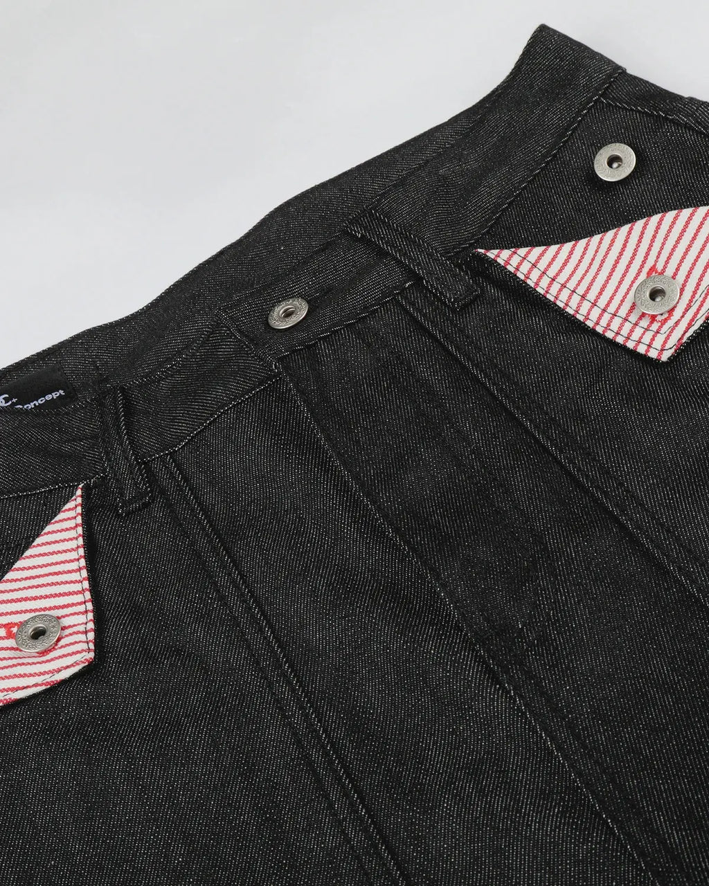 Inflation Deconstructed Utility Baggy Jeans with oversized fit, multiple pockets, and distressed details in dark denim.