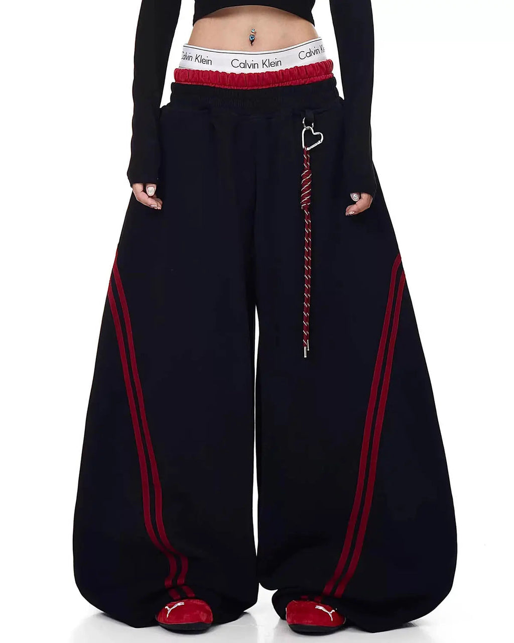 Grey striped baggy sweatpants from INFLATION Streetwear, featuring a relaxed fit and comfortable fabric.