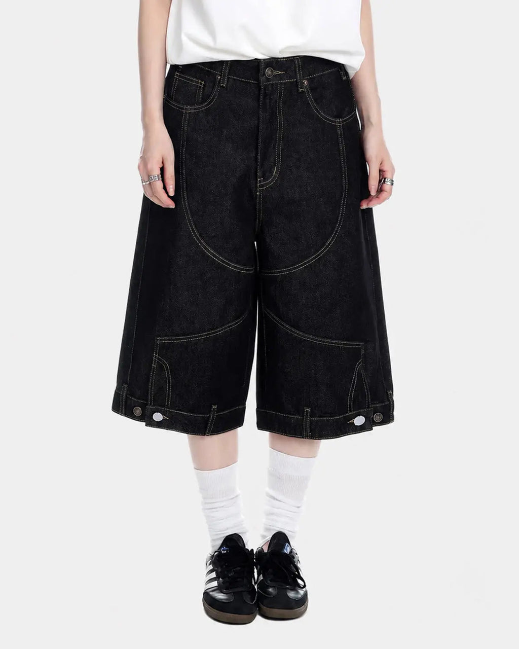 Deconstructed raw denim jorts pants by INFLATION Streetwear featuring frayed edges and distressed details.