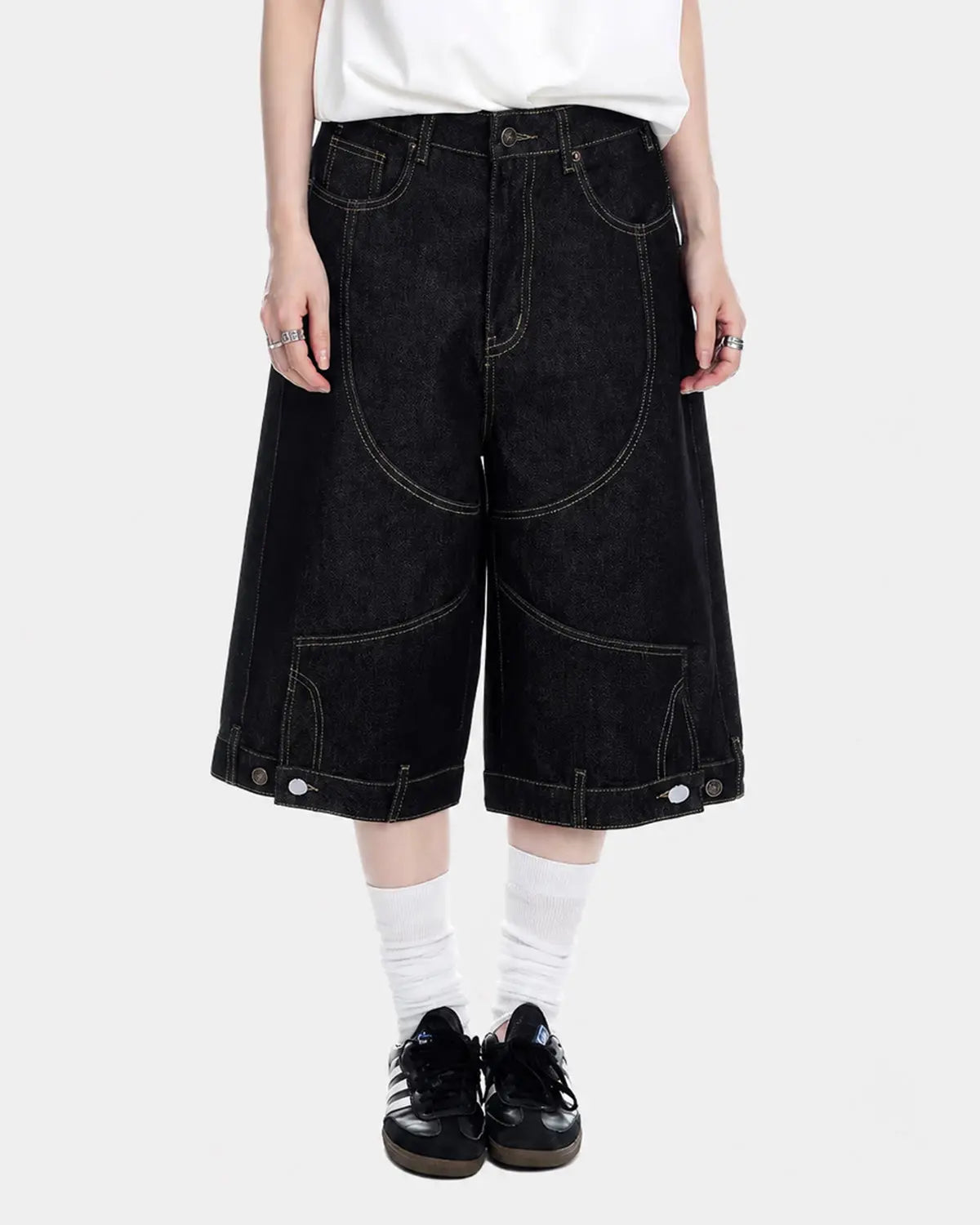 Deconstructed raw denim jorts pants by INFLATION Streetwear featuring frayed edges and distressed details.