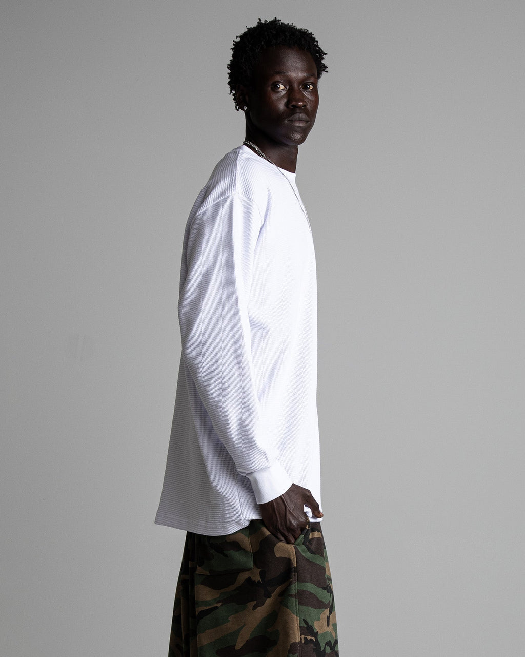 Shaka Wear heavyweight long-sleeve thermal shirt in black, showcasing a snug fit and soft thermal fabric for cold weather.