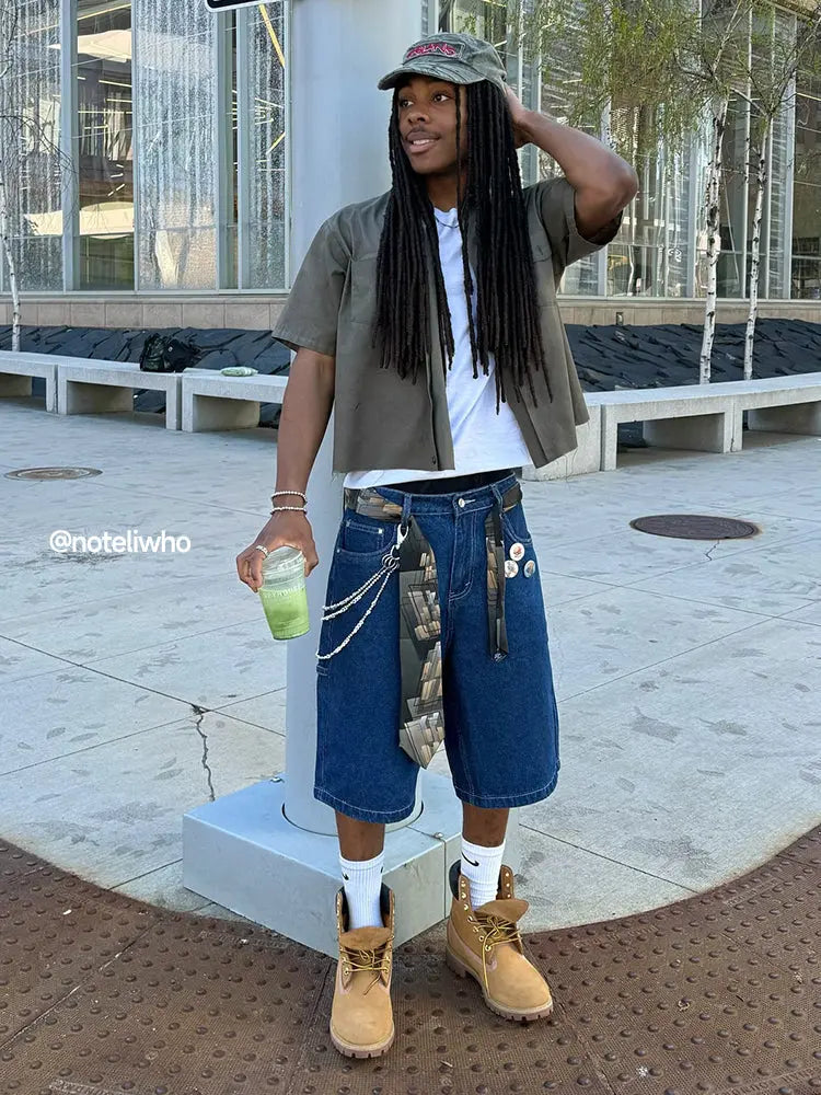 Vintage washed INFLATION straight jorts, denim pants with distressed details and a casual fit, displayed on a neutral background.