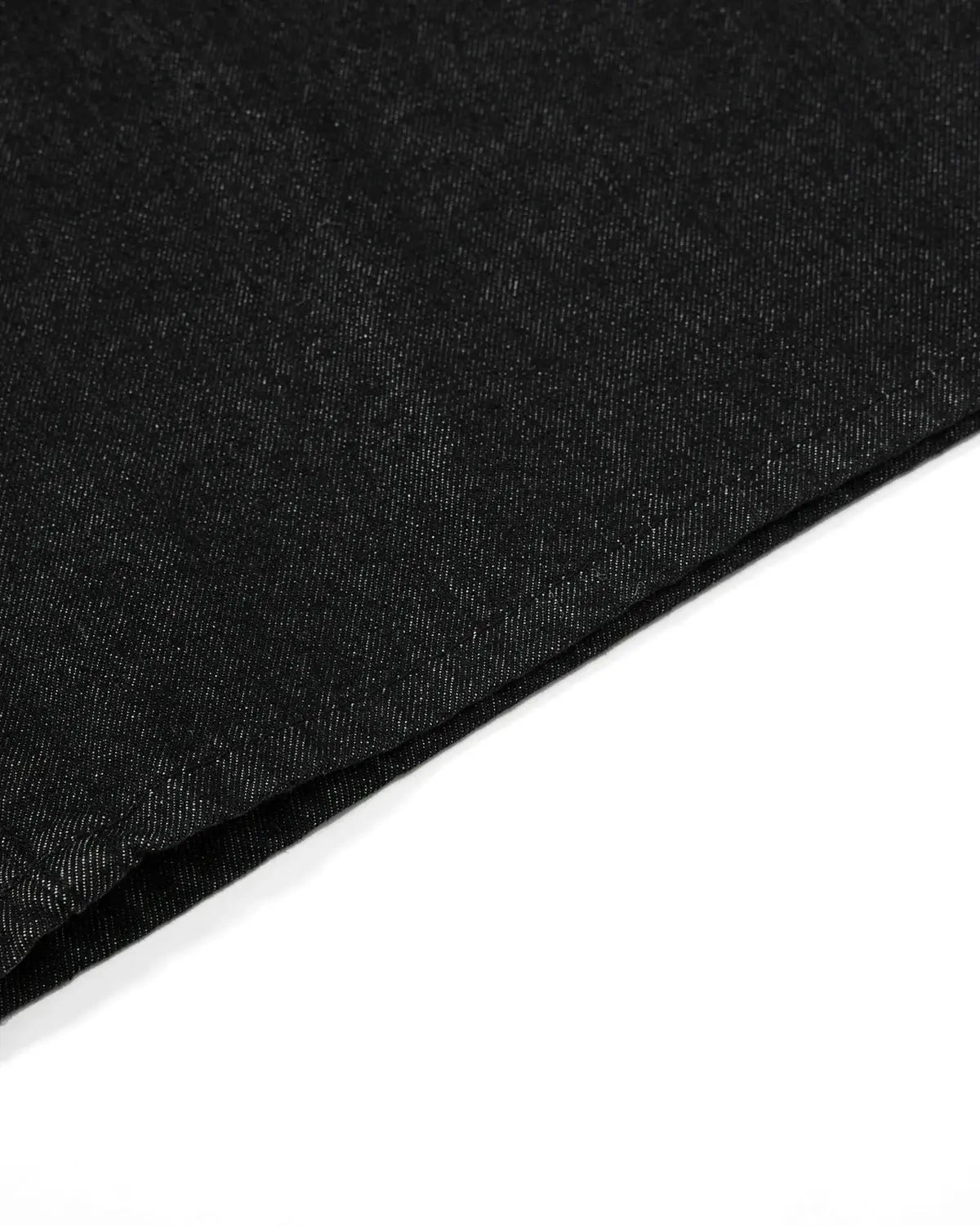 Inflation Streetwear asymmetric button raw denim jorts, casual men's pants with distressed finish and raw hem detail.